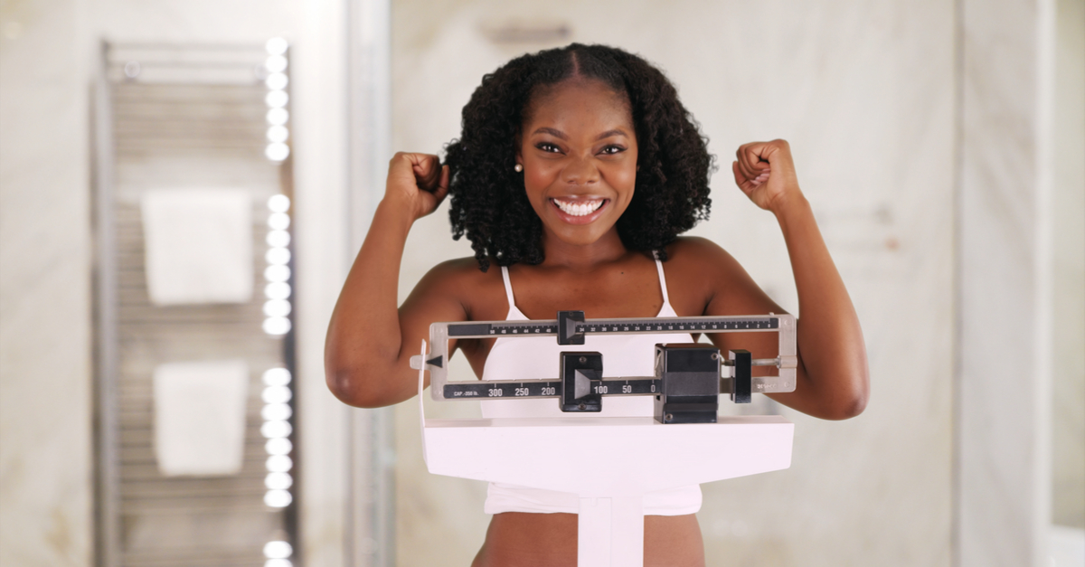 woman excited about weight loss