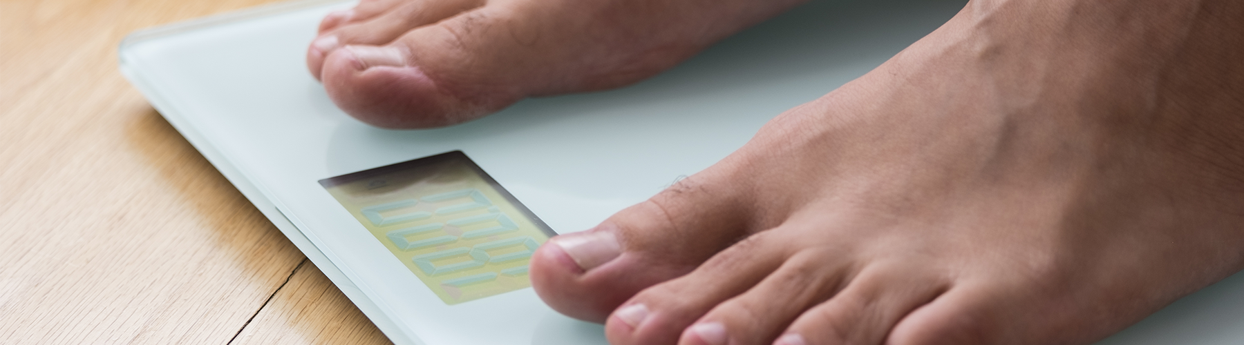 male feet on scale