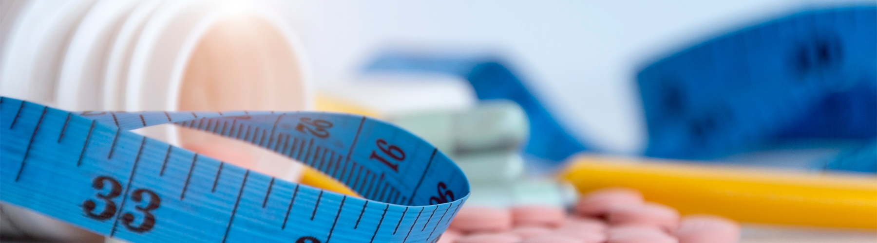 Pills, bottles, and measuring tapes
