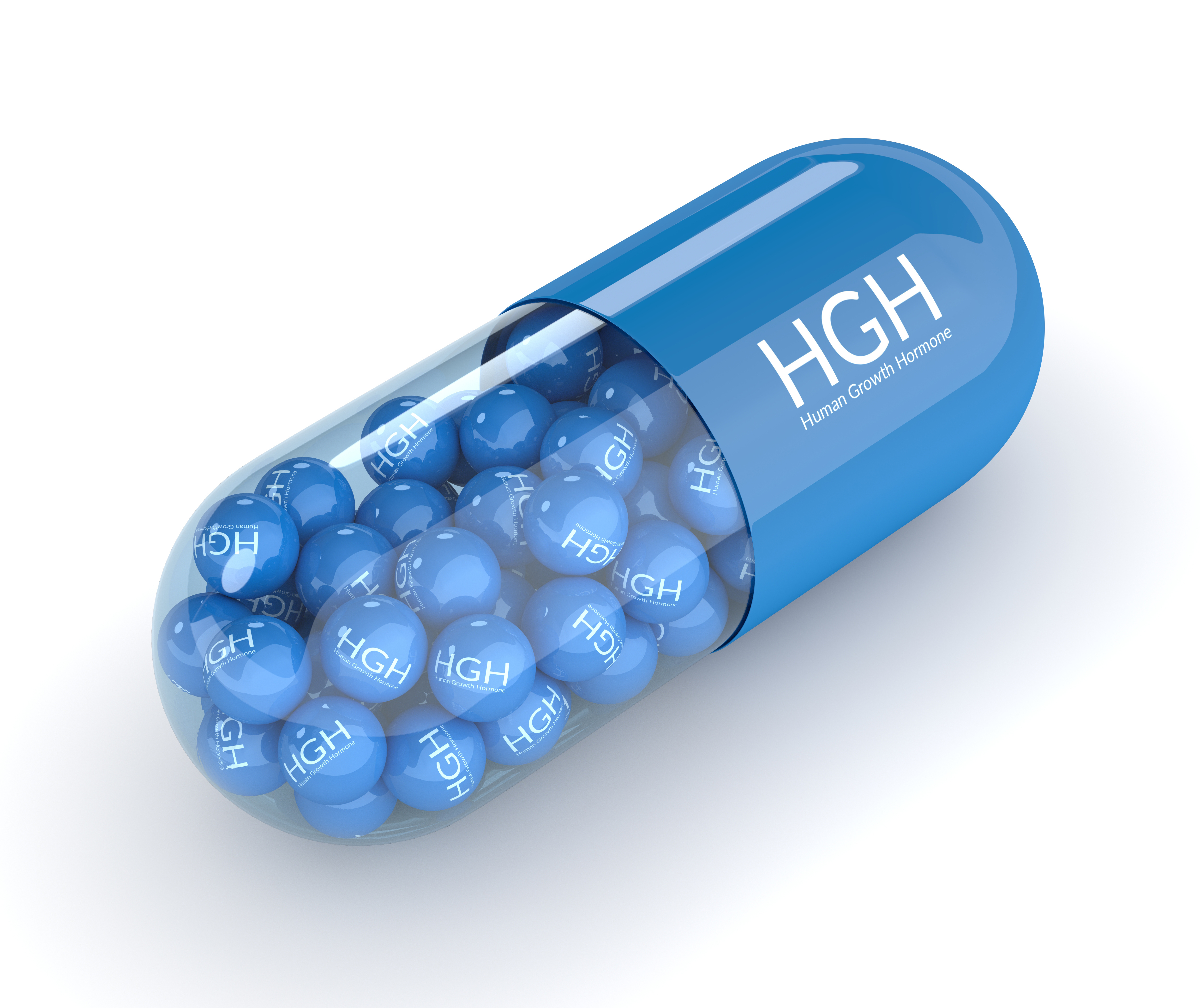 An oversized picture of a pill that says human growth hormone on it.