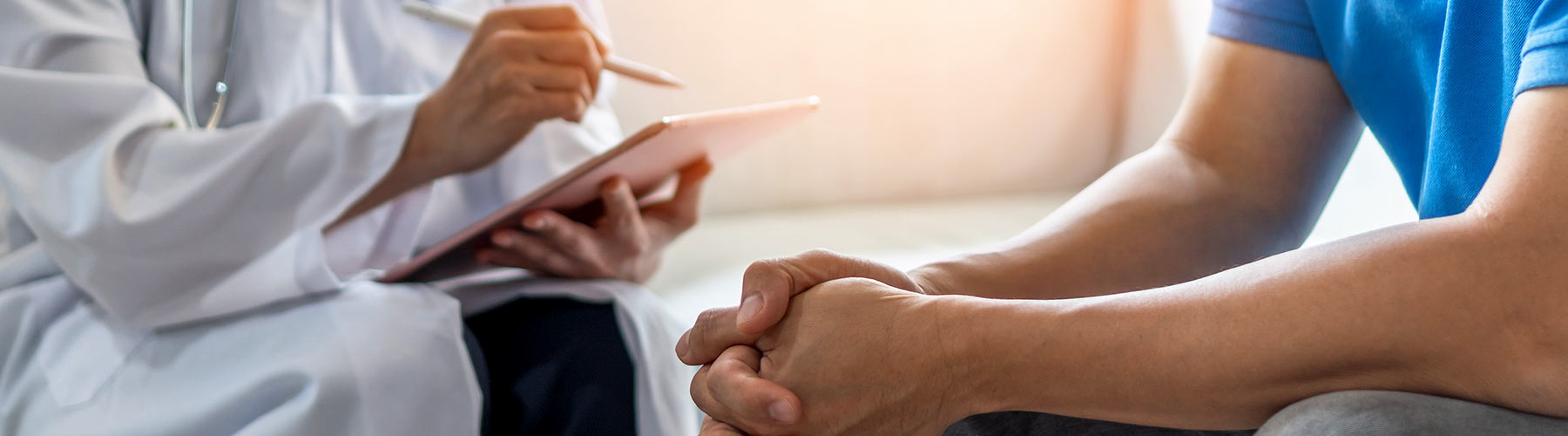 Man consulting with a doctor about testosterone replacement therapy